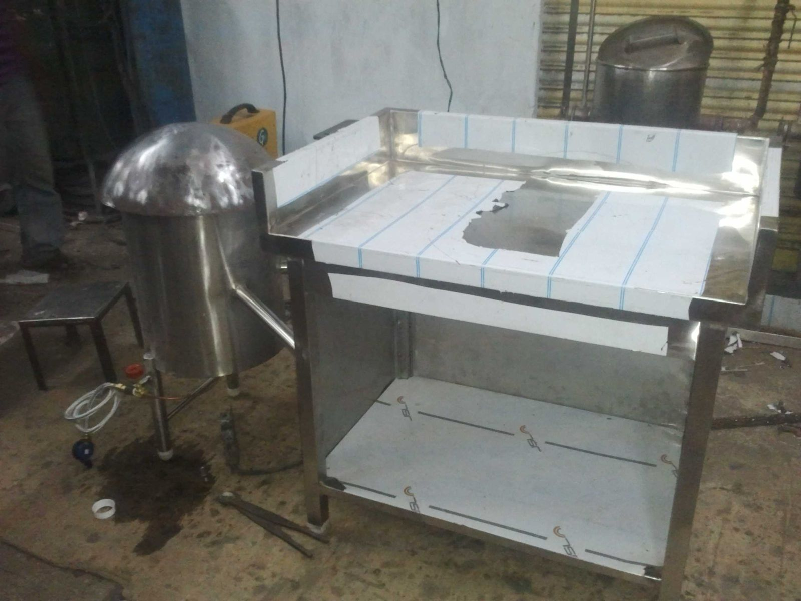 Rumali Roti Stove Setup — domed tawa burner with prep table